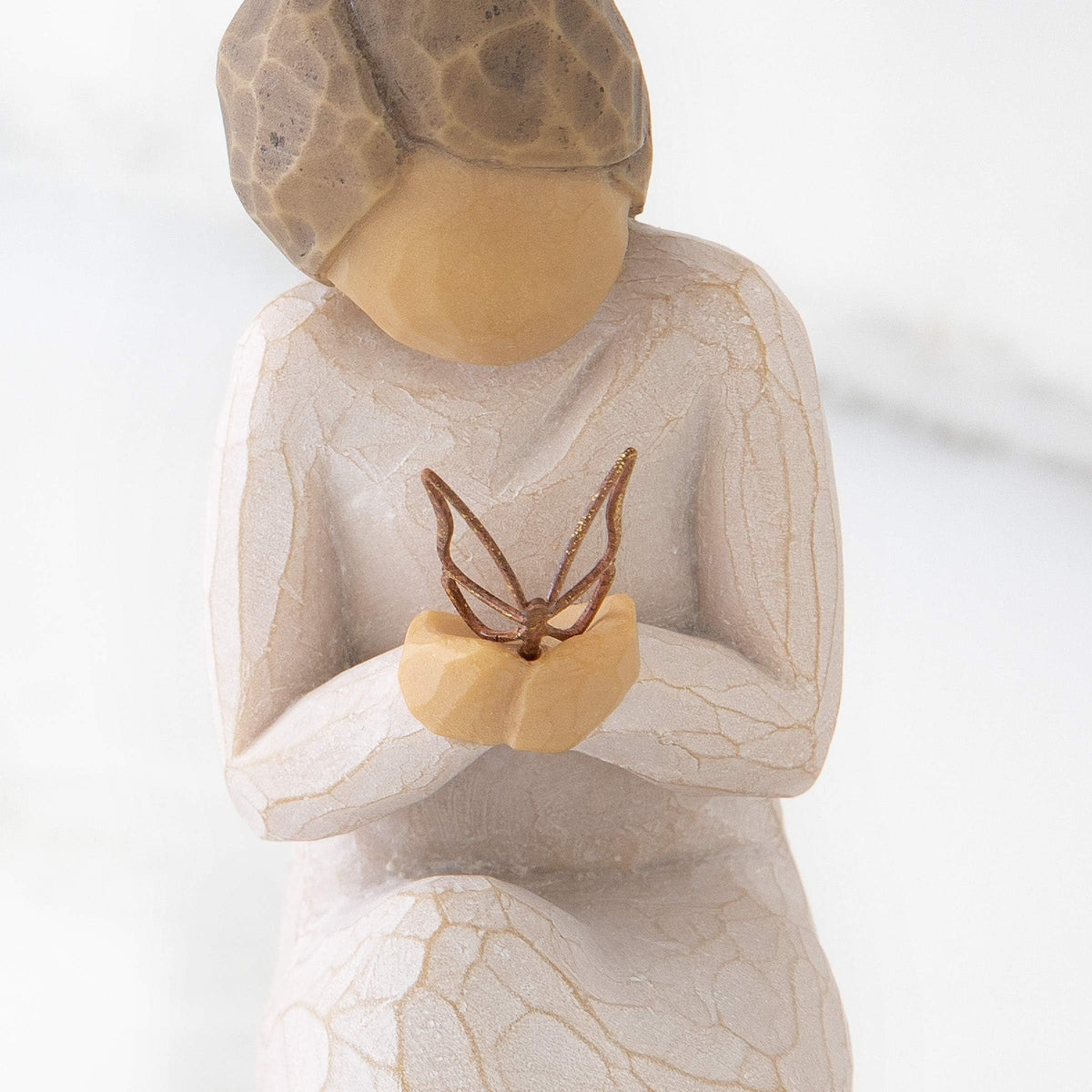 Willow Tree Quiet Wonder gold leaf butterfly adds warmth to display