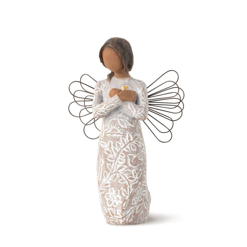 Willow Tree Remembrance Angel with darker skin, crossed arms over a gold heart.