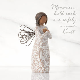 Willow Tree Remembrance Angel features a gold leaf heart and symbolic dress for sympathy.