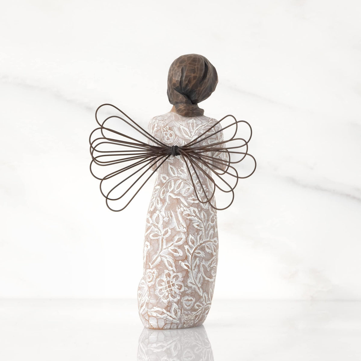Willow Tree Remembrance Angel is hand-painted resin with warm, tactile detail.