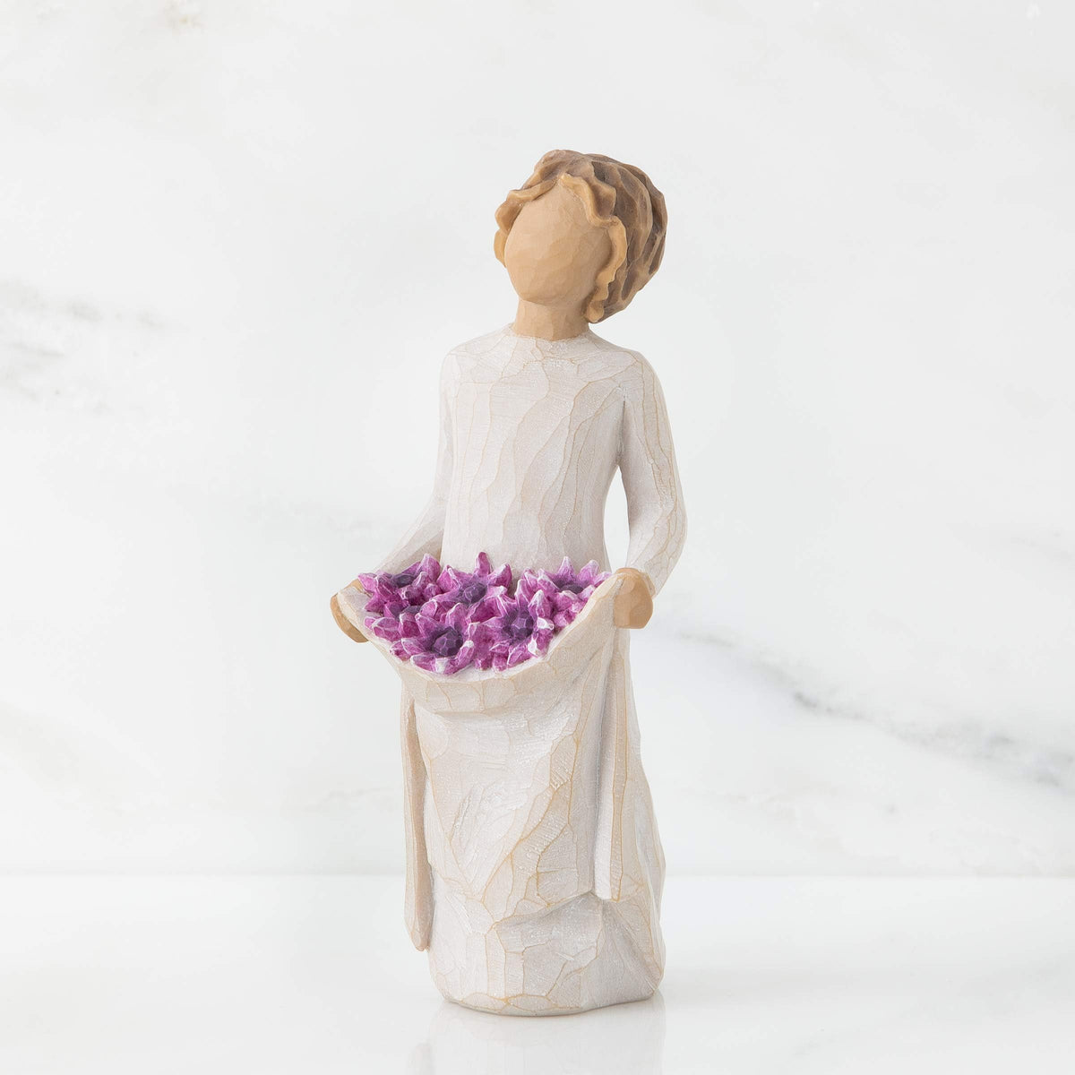 Willow Tree Simple Joys hand-painted resin figure adds warmth to shelves.