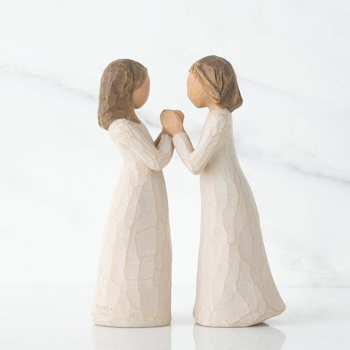 Willow Tree Sisters by Heart cream-dressed figures displayed for home decor.