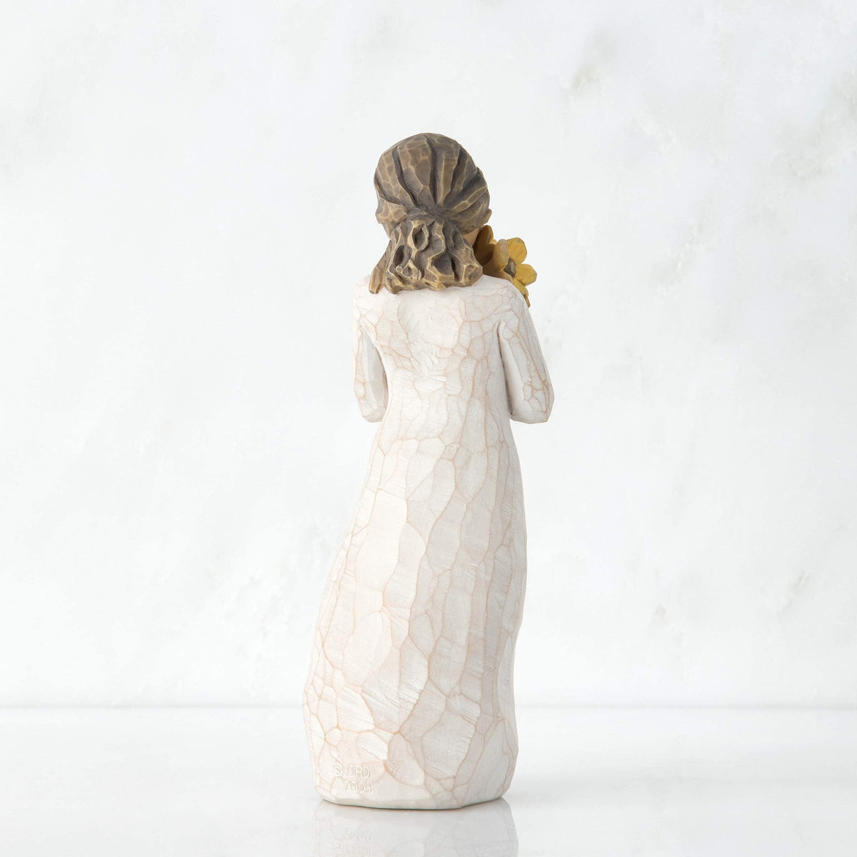 Willow Tree Warm Embrace enclosure card conveys warmth among loved ones.