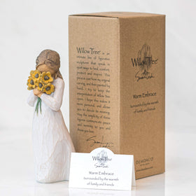 Willow Tree Warm Embrace displayed on a mantel with timeless appeal.