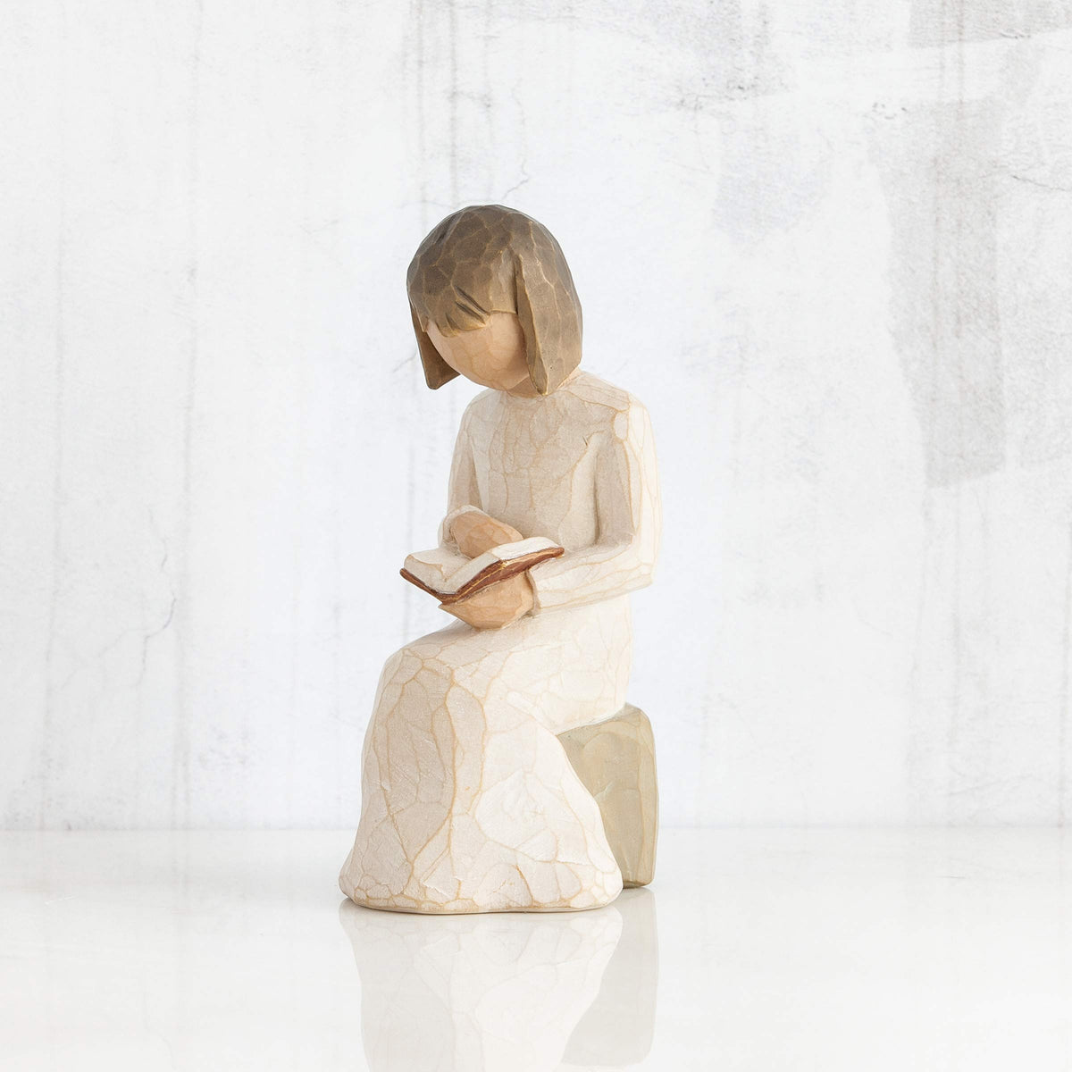 Willow Tree Wisdom cream dress seated figure on a rock, perfect shelf centerpiece.