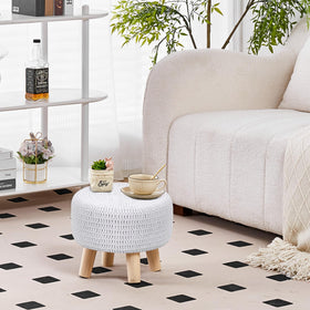 Wimarsbon pouf with non-skid wood legs stays securely in place.