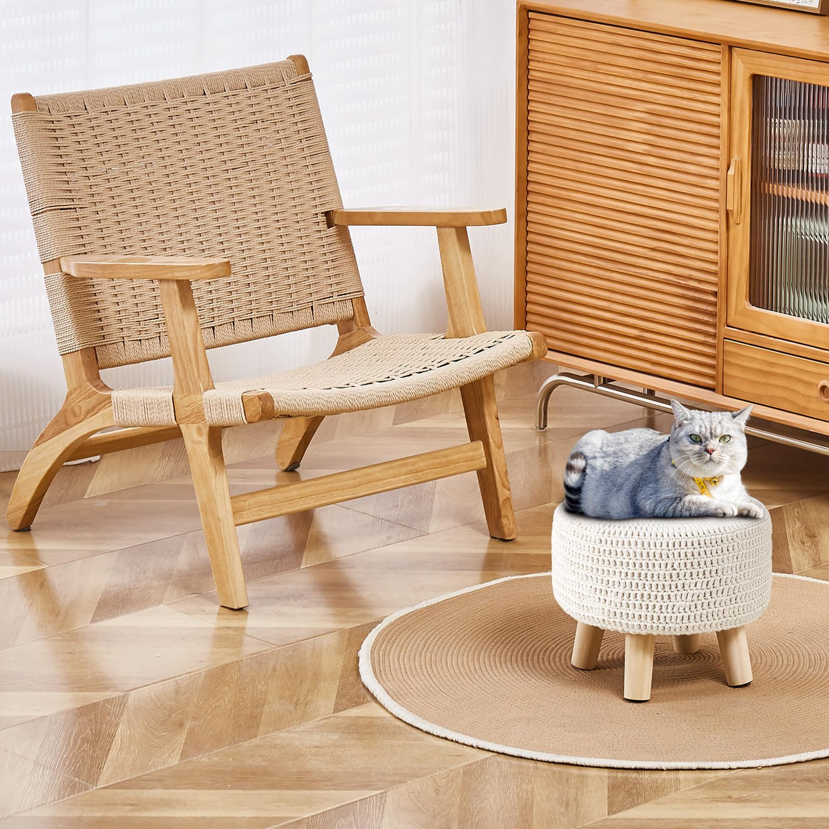 Wimarsbon round footstool with wood legs offers sturdy sofa support.