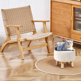 Wimarsbon round footstool with wood legs offers sturdy sofa support.