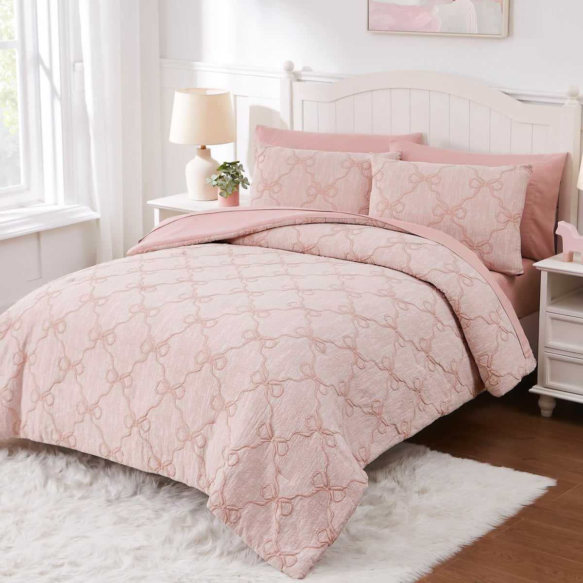 Wink Deer Pink Diamond fitted sheet showing soft, durable fabric under bed frame