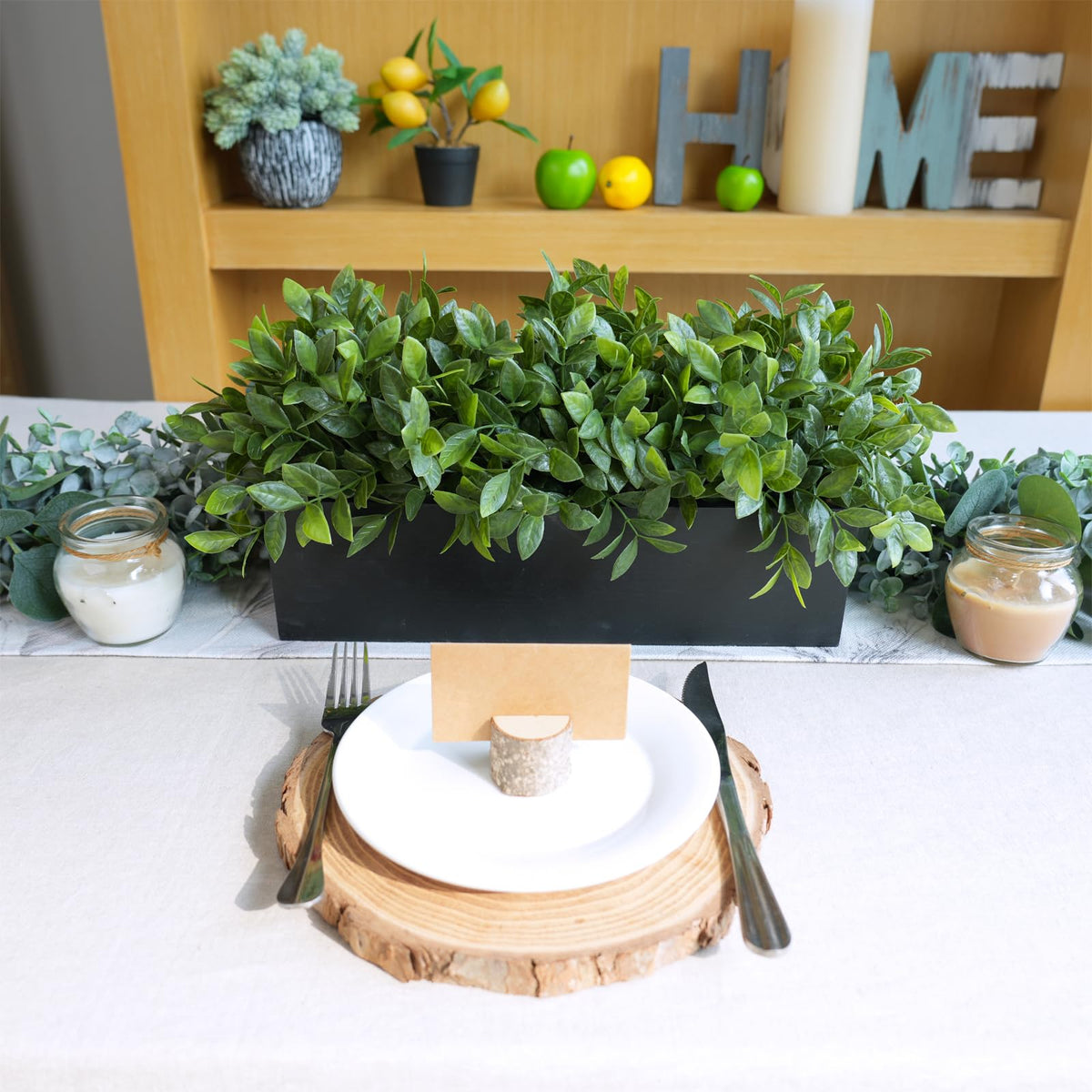 Unboxed view of the 14-inch Winlyn boxwood plant and planter.