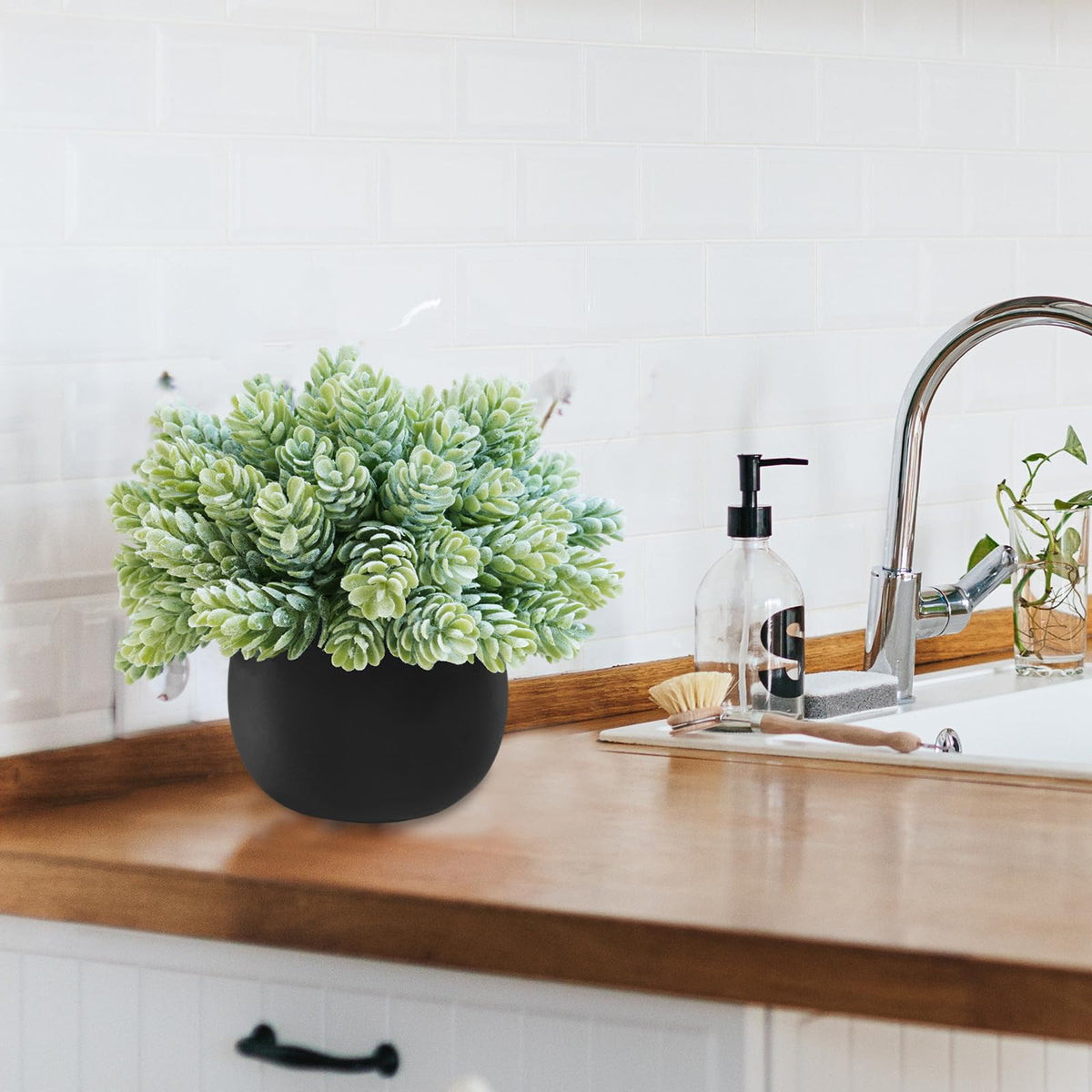 Winlyn faux succulents with macrame hangers create stylish wall displays.