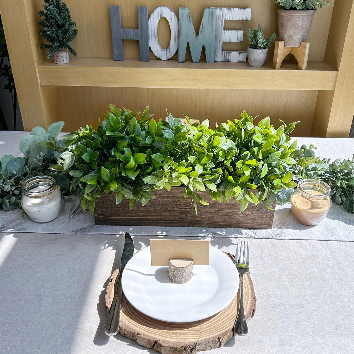 Winlyn artificial boxwood texture close-up demonstrates authentic greenery without watering.