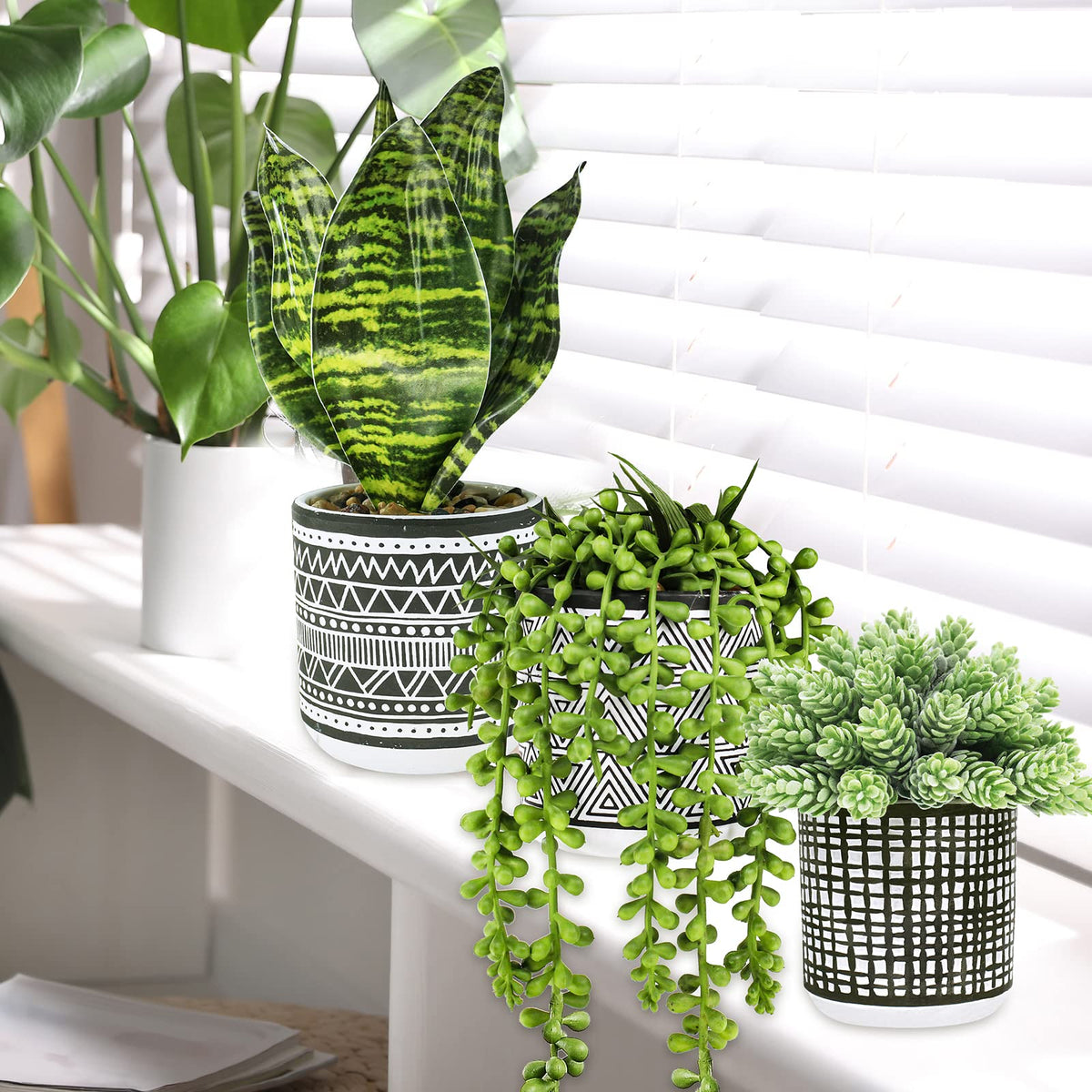 Winlyn concrete ceramic pots feature textured geometry for contemporary decor.