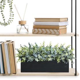 Wedding centerpiece idea using Winlyn eucalyptus in a black wood planter.