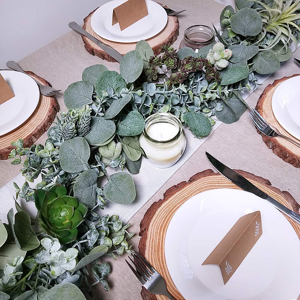Winlyn eucalyptus garland framing a welcome sign for a cohesive event look.
