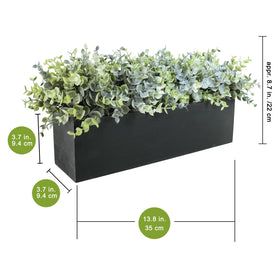 Pebble-covered base supporting Winlyn artificial greenery for a natural look.