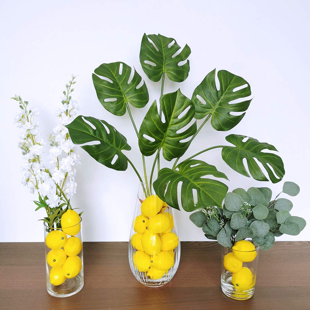 Winlyn lemon-faux-fruits vase filler adds sunny ambience to your table settings.