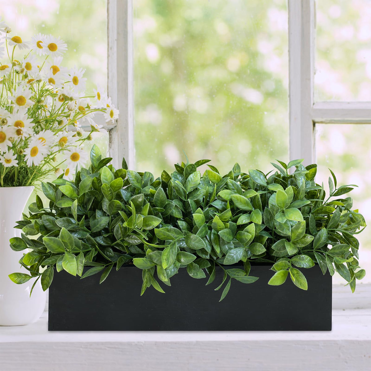 Mantel display: Winlyn boxwood centerpiece adding greenery and texture.