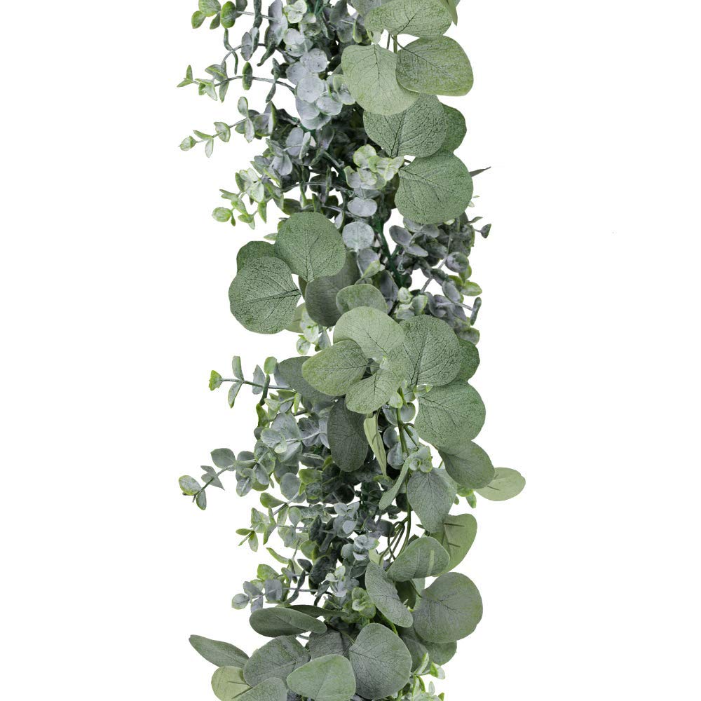 Winlyn eucalyptus garland used as a table runner accent with soft greenery.