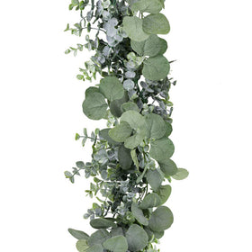 Winlyn eucalyptus garland used as a table runner accent with soft greenery.