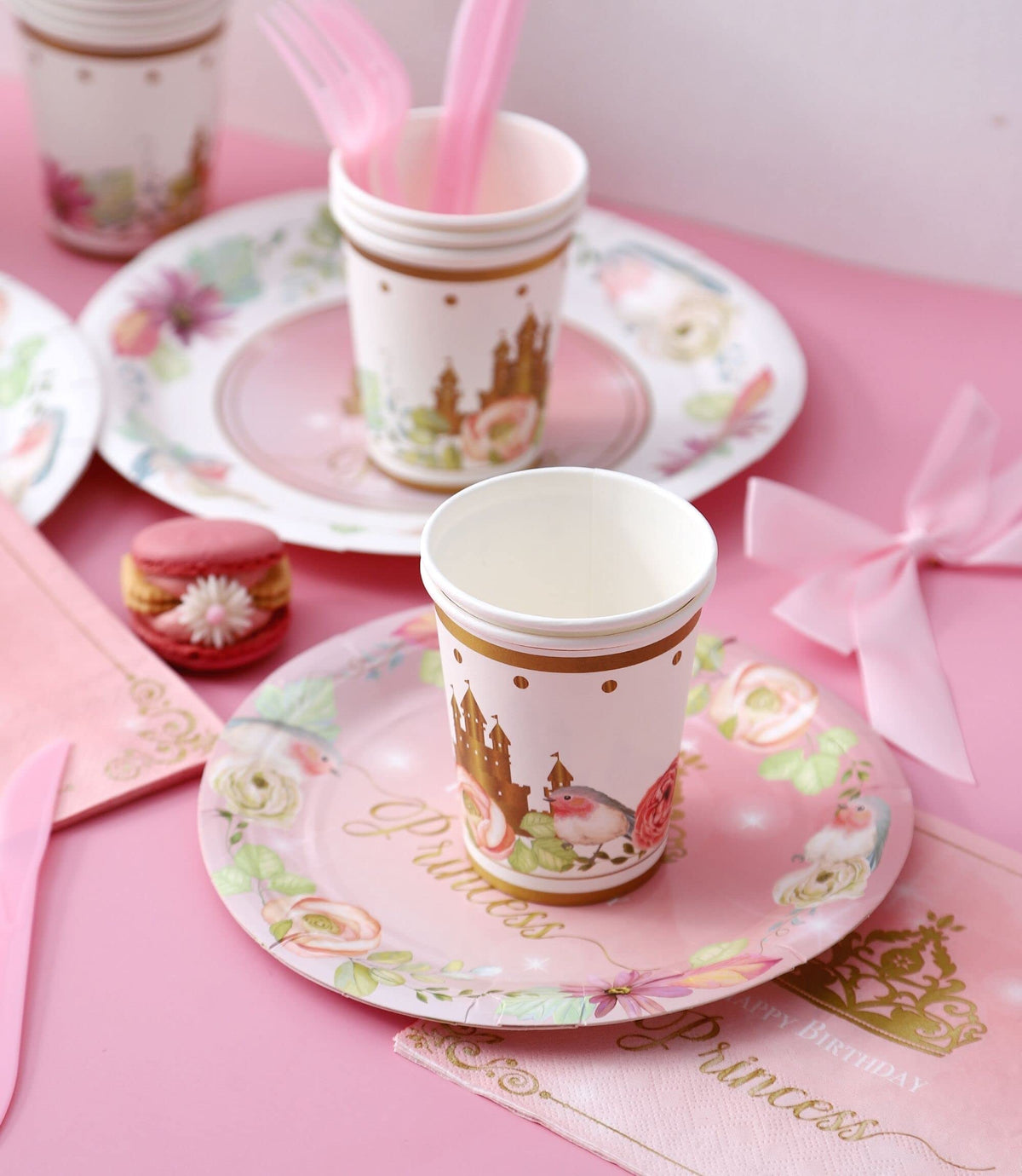 Winoo Design Princess tablecloth creates a cohesive party backdrop.