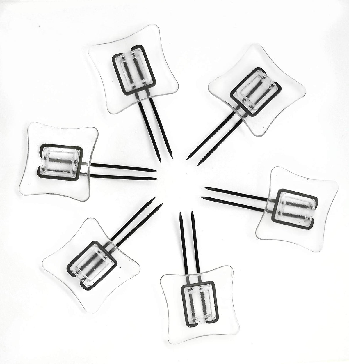 Wise Linkers rug pins pack-6 anchors securing a rug over an underlay for stability.
