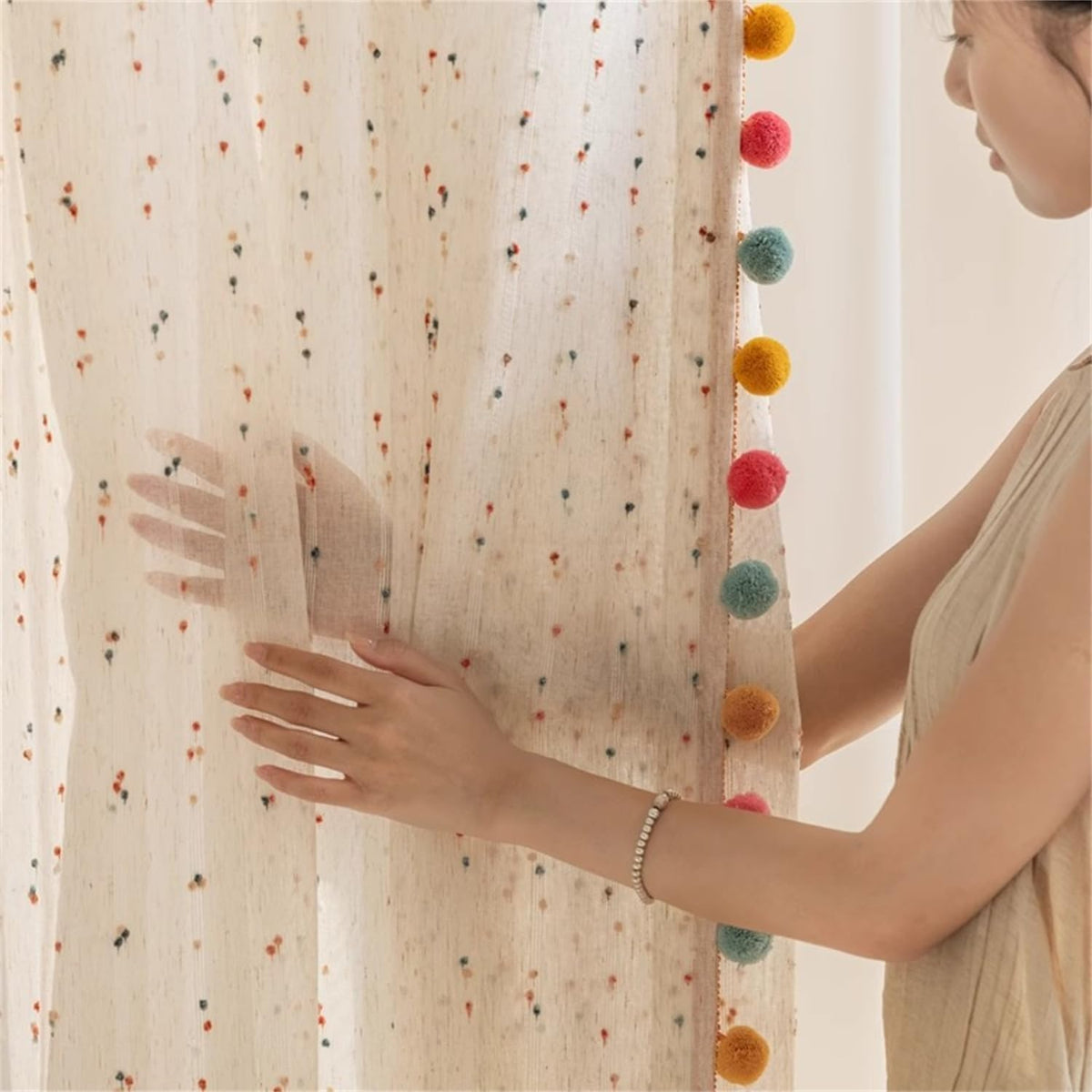 WJLQLM white linen-look sheer curtain creates cozy, diffused daylight in nursery.