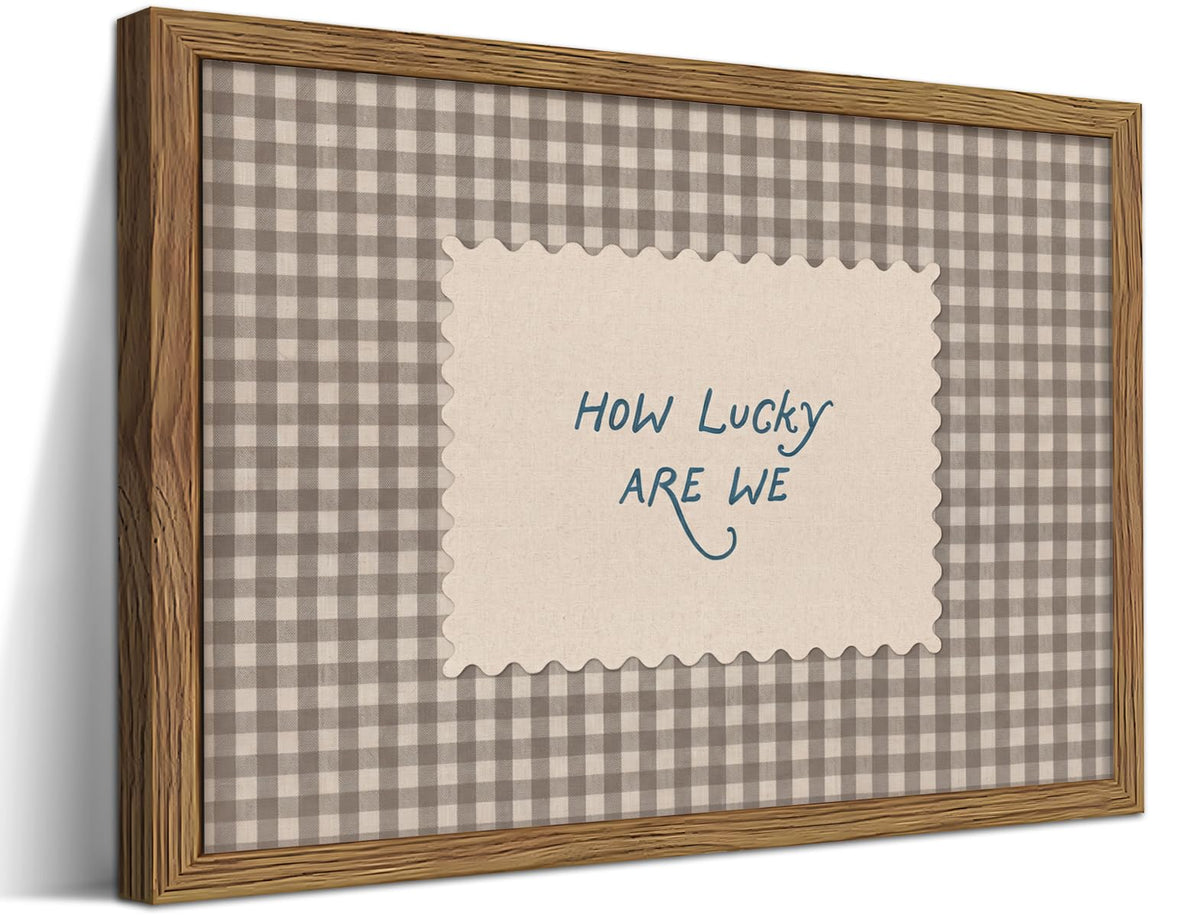 WLHARTT How Lucky Are We wall art with gingham frame provides cozy inspiration for living rooms.