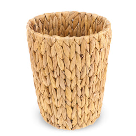 WLLHYF wicker waste basket with handwoven texture, perfect for small bathroom spaces.