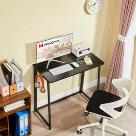 WOHOMO folded desk slim width for easy storage behind doors.