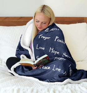 Wolf Creek Blanket Compassion blue folded display; cozy style and easy snuggle readiness.