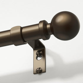 Wolistsa bronze curtain rod finials add timeless style and versatile room compatibility.