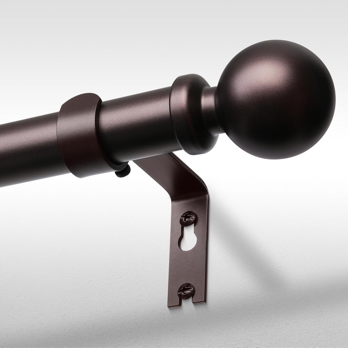 Wolistsa red bronze curtain rod ends add a refined decorative touch.