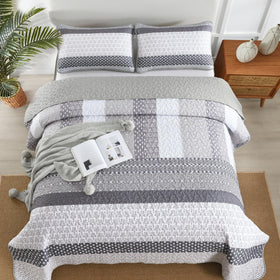 WONGS BEDDING grey quilt sham set complements 20x28 pillows with subtle pattern variation.