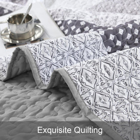 WONGS BEDDING queen-size set packaging displaying included quilt and two shams.