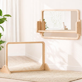 Woodtoe 3-in-1 Montessori mirror on the floor for floor tummy time exploration.