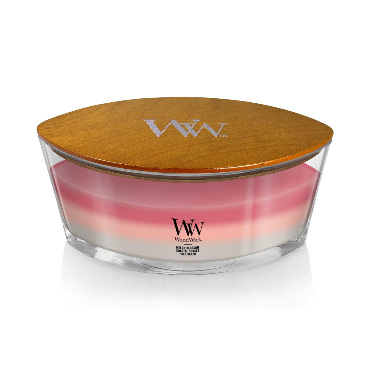 WoodWick Coastal Sunset layered fragrance releasing sunlit coastal notes