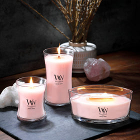 WoodWick Coastal Sunset delivers lasting fragrance with a premium wax blend in a cozy room.