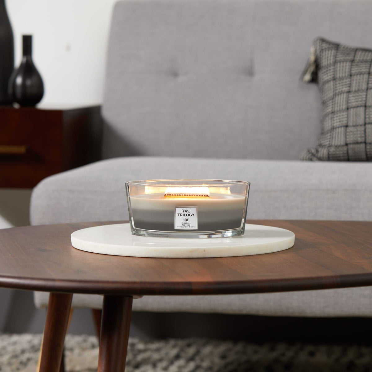 WoodWick Ellipse Trilogy candle presents three layered scents in one vessel.