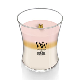 WoodWick Island Getaway Trilogy showing wax layers melting to reveal new fragrance notes.