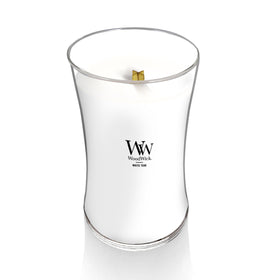 WoodWick Large Hourglass Candle White Teak fragrance blend fills the room with woody notes.