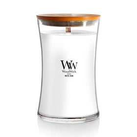 WoodWick Large Hourglass Candle White Teak jar elevates decor with subtle fragrance.