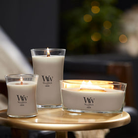 WoodWick long dancing flame enhances fragrance throw across the room.