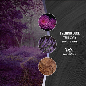 WoodWick Evening Luxe candlelit living room setup with layered scents.