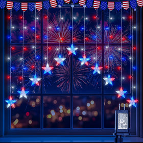 woohaha Fourth of July star icicle lights illuminate a festive window display