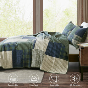 Woolrich Mill Creek patchwork quilt fabric texture highlighting soft, prewashed cotton feel.