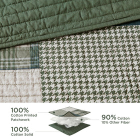 Woolrich Mill Creek quilt shams paired with patchwork bed coverage for a complete look.