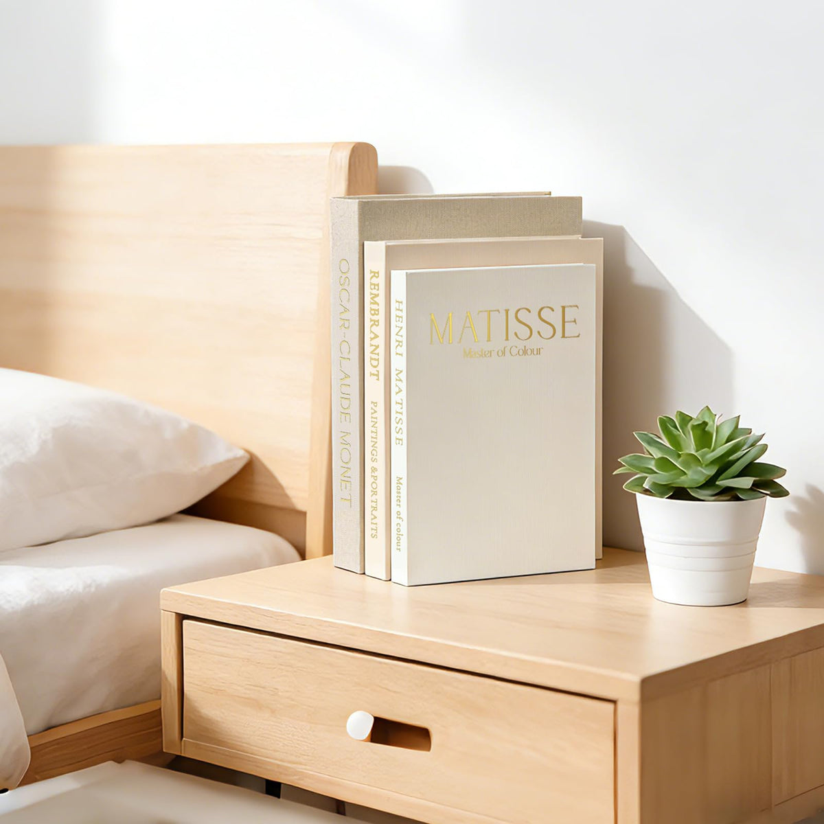 Styled on a living room shelf with vases and photos.