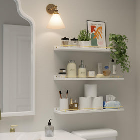 Bedroom wall display setup using WOPITUES shelves for books and decor