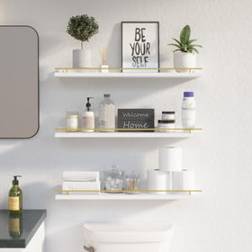 Close-up of the gold guardrail protecting items on a WOPITUES shelf
